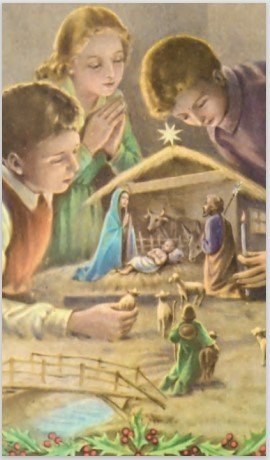 Bambini davanti al presepe