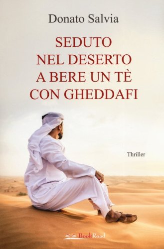 Seduto nel deserto a bere un t&egrave; con Gheddafi
