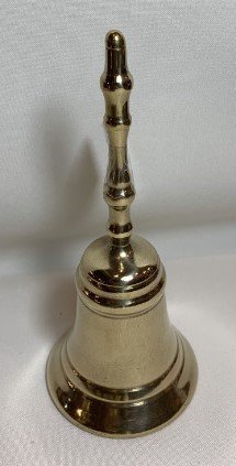 CAMPANELLO - Realizzato in ottone. Altezza 15 cm.